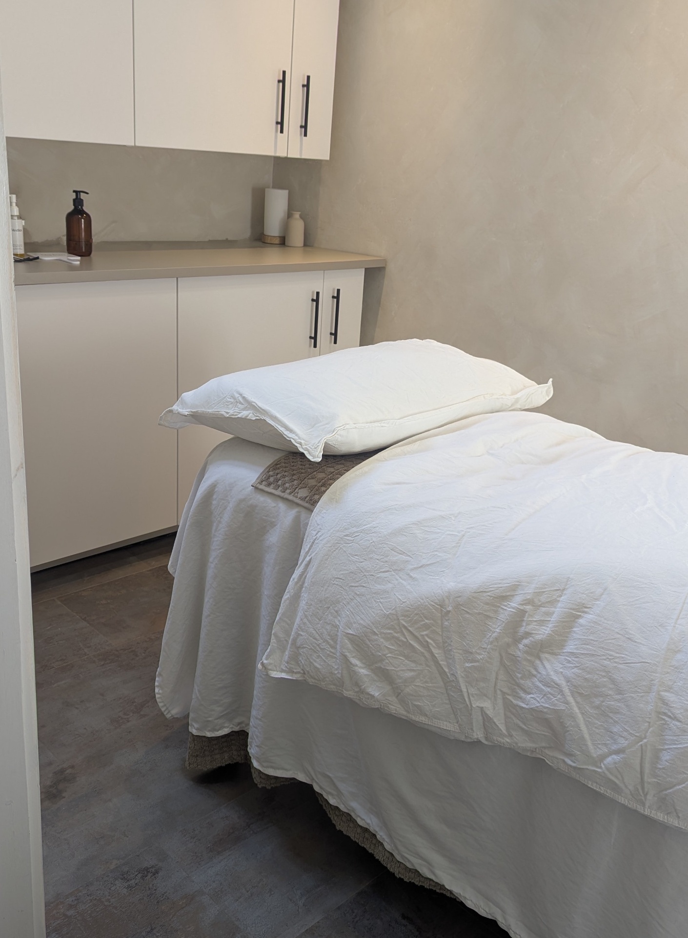 The treatment room interior — calm, neutral and clinical